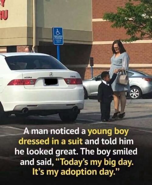 A young boy in a suit standing with a woman in a parking lot with text overlay detailing a conversation about it being his adoption day.